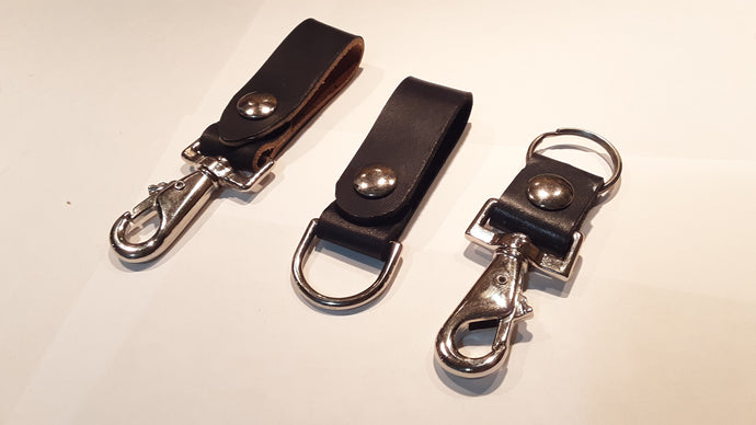 Ghostbusters heavy duty belt fobs by Whitaker Leather. Screen accurate for cosplay or everyday use.